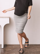 Main view - A Pregnant Woman in Grey Fitted Maternity Skirt (6708490141799) (6733183352926)