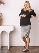 Full view - A Pregnant Woman in Grey Fitted Maternity Skirt (6708490141799) (6733183352926)