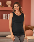 A Pregnannt Woman Wearing Maya Maternity & Nursing Cotton Tank in Black from Angel Maternity.