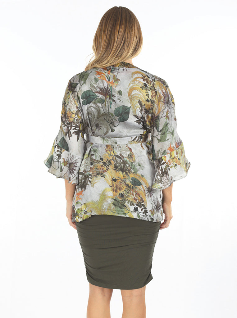 a woman in maternity wrap floral blouse, back (6659038412894)