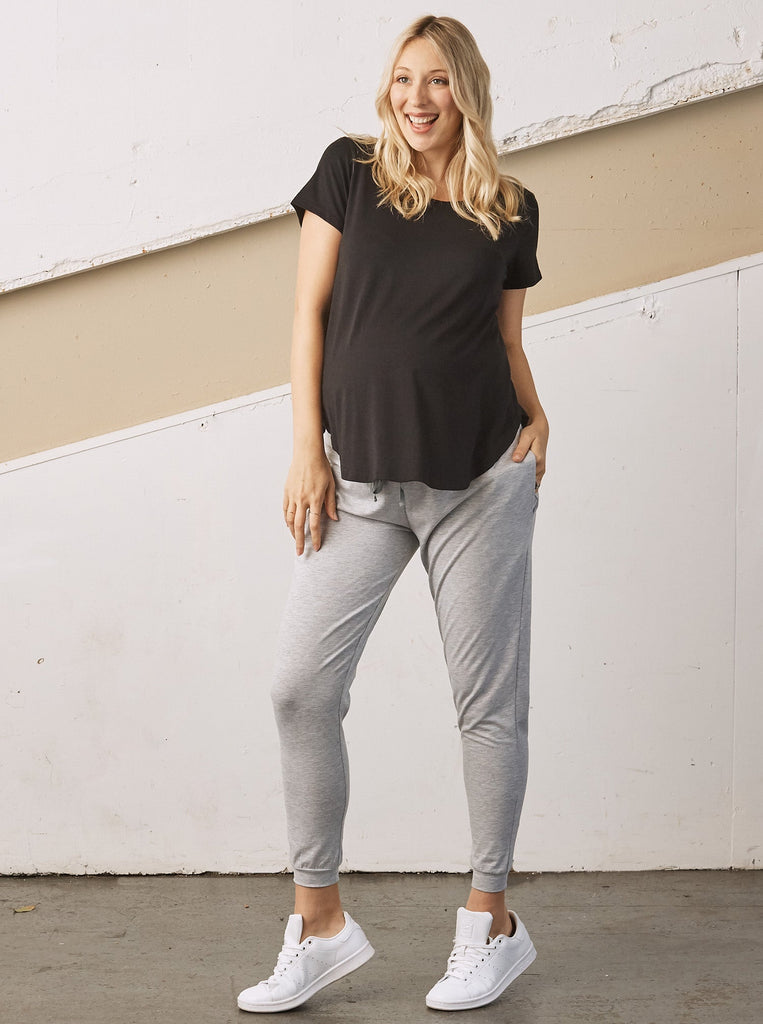 Full view - A Pregnant Woman in Feather Grey Cotton Maternity Jogger Pants  smiling (6709414494311)