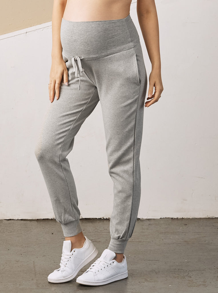 Main View - A Pregnant Woman in Essential Maternity Sweatpants in Grey Color from Angel Maternity (6728300920926)