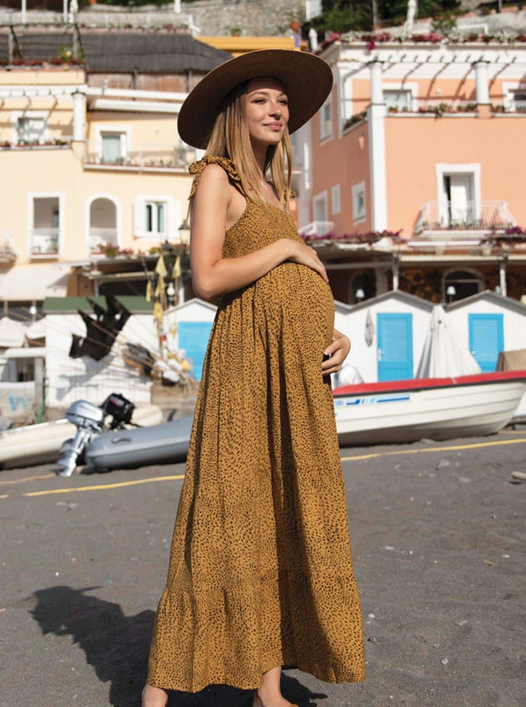 A woman in mustard print maternity dress, main (6656901152862)