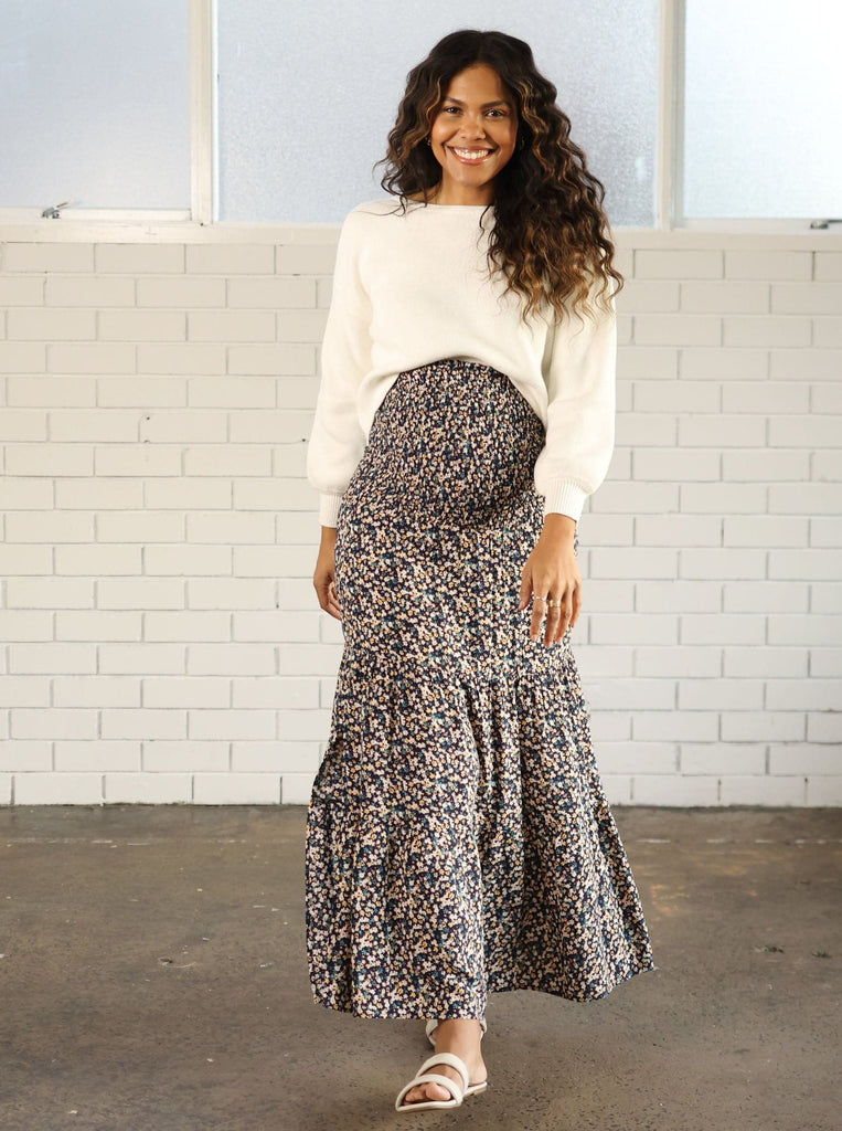 Main view - A pregnant Woman in Maternity Long Shirred Floral Maxi Skirt in Navy Colour from Angel Maternity   (6699030315111)