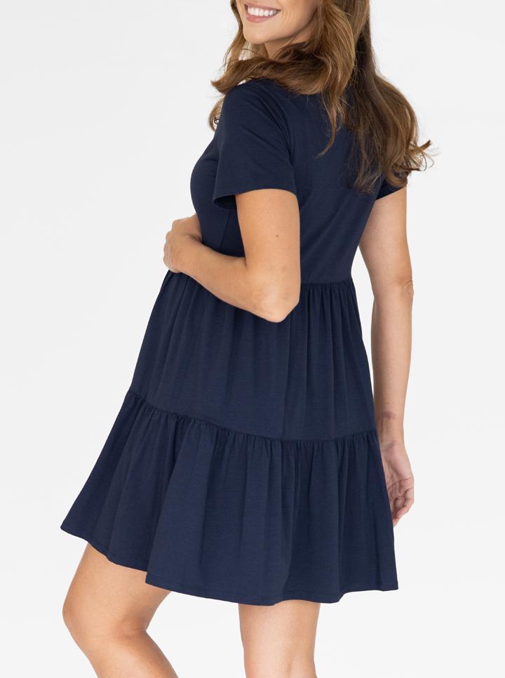 A woman in navy maternity tiered dress, back (4827569651806)