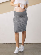 Close view - A Pregnant Woman in Knee Length Navy Stripes Maternity Fitted Skirt (6708020510823) (6733183320158)